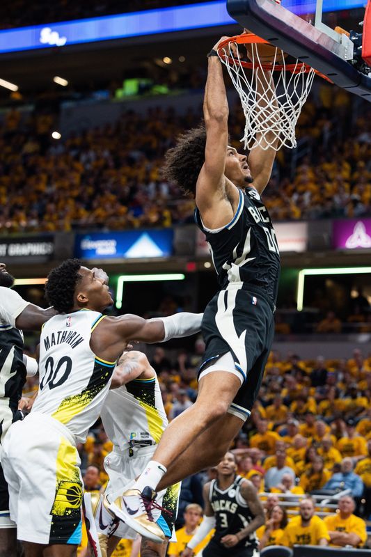 Milwaukee Bucks center Jericho Sims scores against the Indiana Pacers.