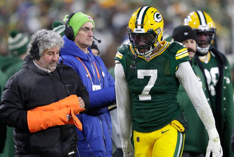 Green Bay Packers linebacker Quay Walker (7) leaves the field after he was ejected from the game against the Detroit Lions during their football game Sunday, January 8, 2023, at Lambeau Field in Green Bay, Wis.