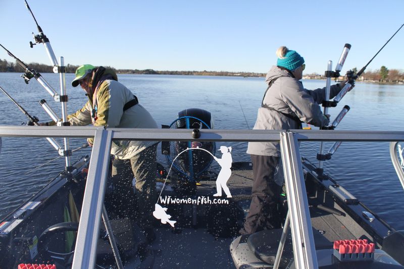 Barb Carey, left, and Rikki Pardun set trolling rods on Rice Lake during the 2025 Governor's Fishing Opener. Carey is president and Pardun is vice-president of Wisconsin Women Fish.