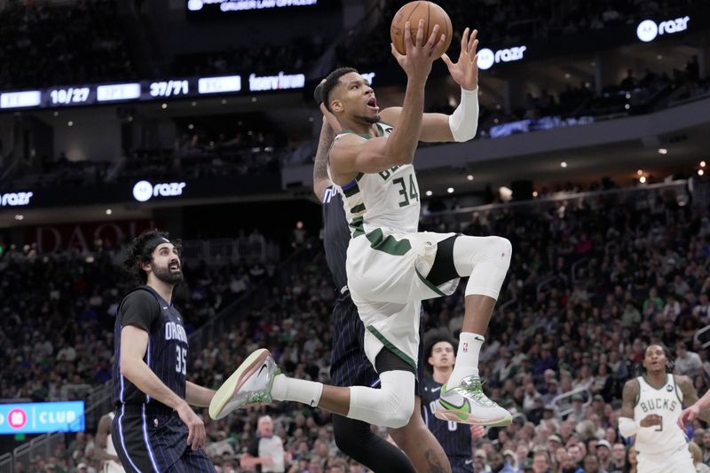 Milwaukee Bucks forward Giannis Antetokounmpo (34) scores during the second half of their game Saturday, March 8, 2025 at Fiserv Forum in Milwaukee, Wisconsin. The Orlando Magic beat the Milwaukee Bucks 111-109.



Mark Hoffman/Milwaukee Journal Sentinel