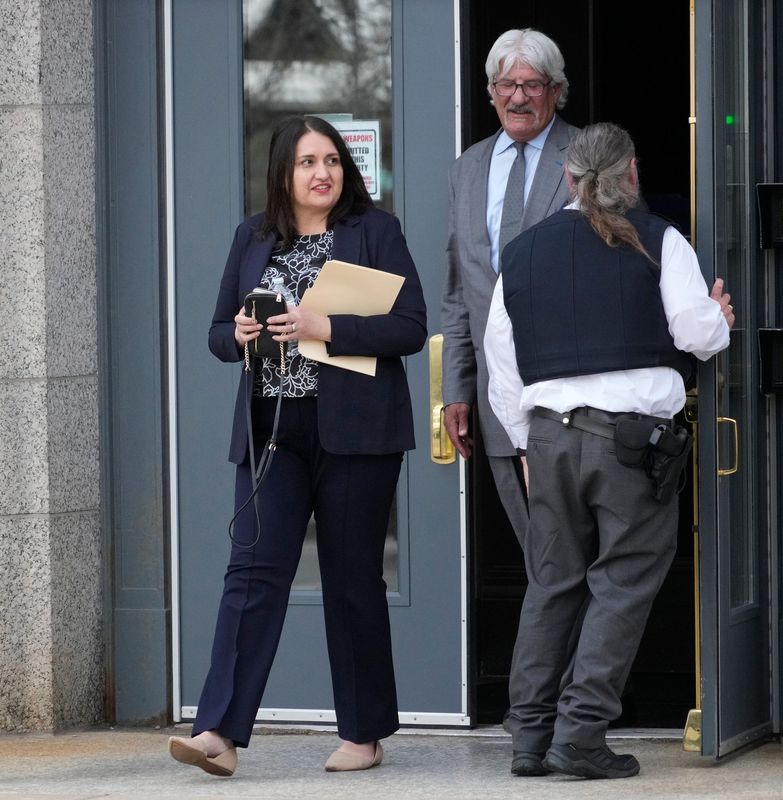 Judge Kristela L. Cervera leaves the Federal Courthouse with attorney Michael Hart, as Milwaukee County Circuit Judge Hannah Dugan's case went before a federal grand jury in Milwaukee on May 13, 2025.