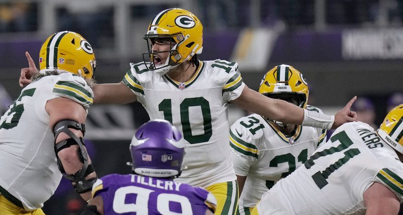 Green Bay Packers quarterback Jordan Love (10) makes an adjustment at the line during the first quarter of their game against the Minnesota Vikings Sunday, December 29, 2024 at U.S. Bank Stadium in Minneapolis, Minnesota.el