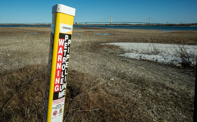 A marker on the north shore of Straits of Mackinac indicates where the Enbridge Line 5 pipeline enters the water in St. Ignace, Michigan.