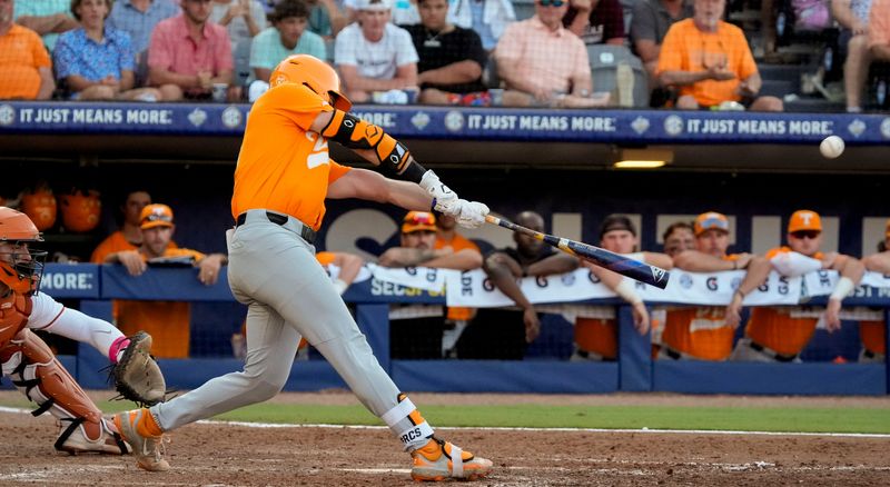 May 22, 2025; Hoover, AL, USA; Tennessee shortstop Gavin Kilen (6) connects for a solo homer to give Tennessee the lead in the 10th inning in the third round of the SEC Baseball Tournament at the Hoover Met. Tennessee eliminated Texas with a 12-inning 7-5 victory. Kilen drove in all three runs in extra innings.