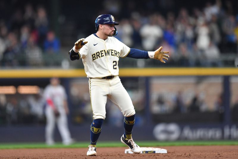 May 28, 2025; Milwaukee, Wisconsin, USA; Milwaukee Brewers third baseman Caleb Durbin (21) celebrates after hitting a two run double during the sixth inning against the Boston Red Sox at American Family Field. Mandatory Credit: Patrick Gorski-Imagn Images