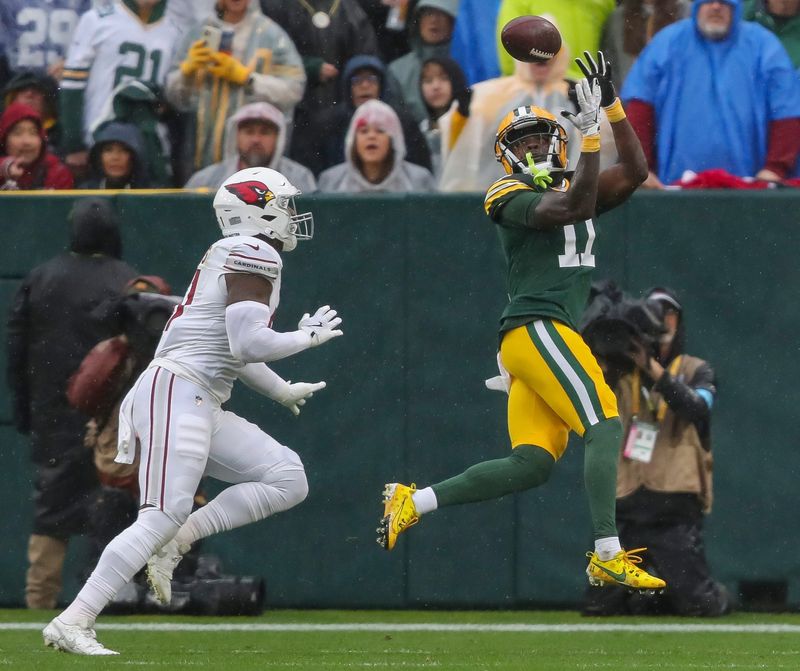 Packers receiver Jayden Reed catches a touchdown pass against the Cardinals in October 2024.