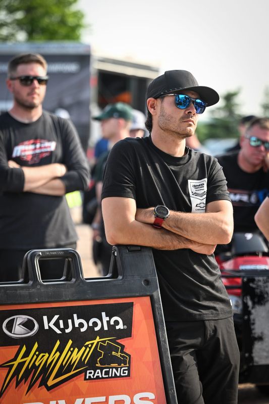 Kyle Larson listens at the drivers meeting at the High Limit Racing sprint car series Rayce Rudeen Foundation Race on Thursday, June 5, 2025, at 141 Speedway in Maribel, Wisconsin.