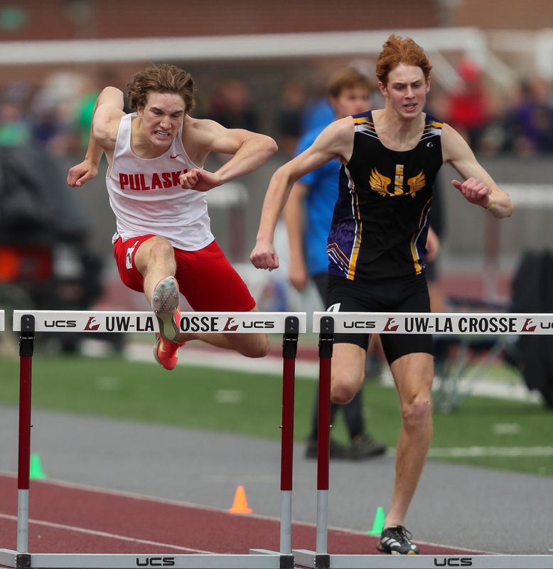 Pulaski High School’s Keaton Dauk, left, clears a hurdle in the Division 1 boys 300-meter hurdles during the second day of the 2025 WIAA state track and field meet on Saturday, June 7, 2025, at Veterans Memorial Field Sports Complex in La Crosse, Wisconsin. 
Tork Mason/USA TODAY NETWORK-Wisconsin