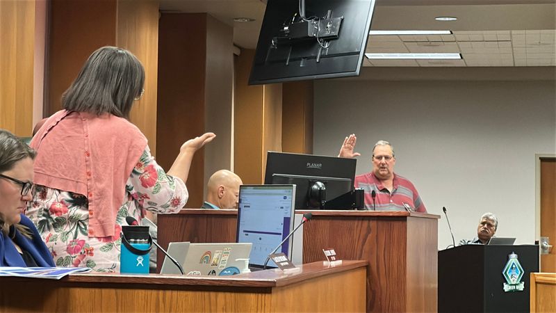 Jim Ridderbush, newly elected District 8 council member to serve out the rest of former council member Chris Wery's term, takes his oath of office at Green Bay City Hall on June 10.
