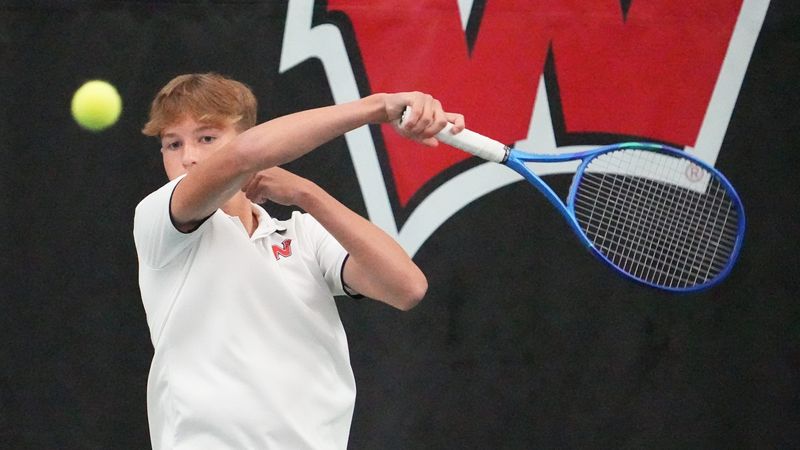 Neenah's Hunter Brown competes in the WIAA state boys team tennis championships, Saturday, June 14, at Nielsen Tennis Stadium in Madison, Wisconsin.