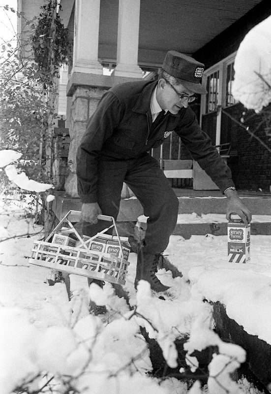 Milkman E.N. Collier takes advance of the snow by placing the cartons of milk in it on his delivers to the homes on his Nashville route Jan. 16, 1968 despite slick roads and even slicker sidewalks.