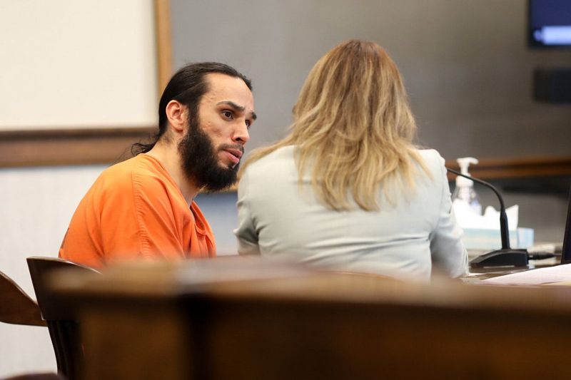 Jacob Ventura of Green Bay speaks with his defense attorney May Lee at a sentencing hearing on June 17 in Green Bay. Ventura pleaded no contest to possessing a firearm as a felon and harboring/aiding a felon in the 2022 shooting death of Randall Denny of Hobart. Ventura was sentenced to seven-and-a-half years in prison, followed by eight years of extended supervision.