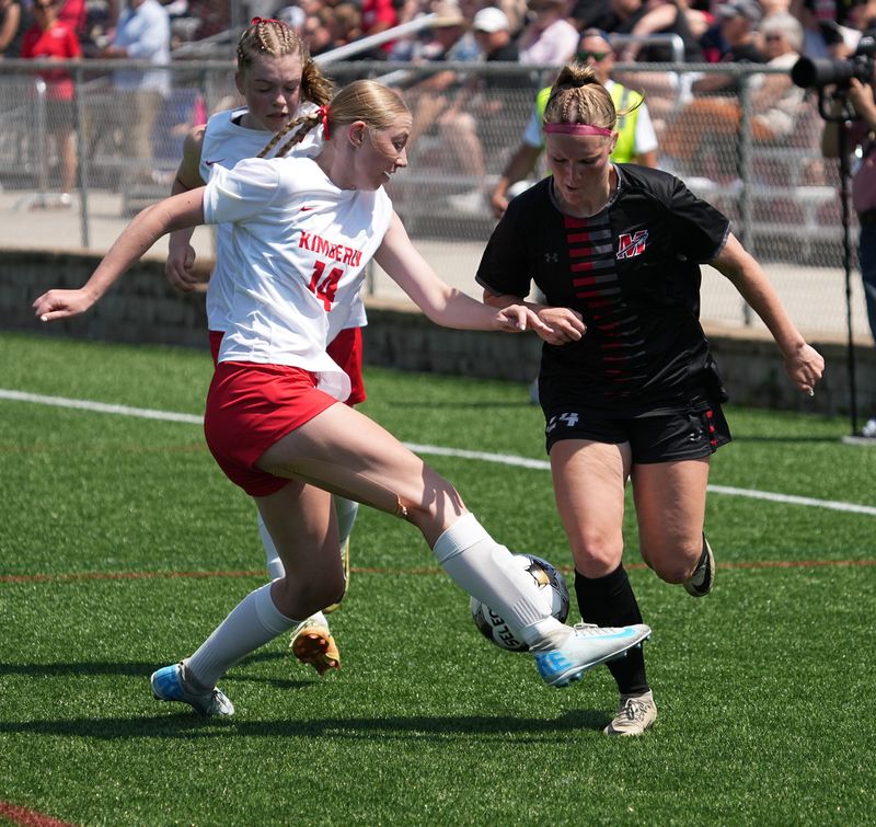 Kimberly's Skyler Brey, left, steals the ball from Muskego's Norah Augustine during their WIAA Division 1 girls state soccer semifinal June 19 at Uihlein Soccer Park in Milwaukee.