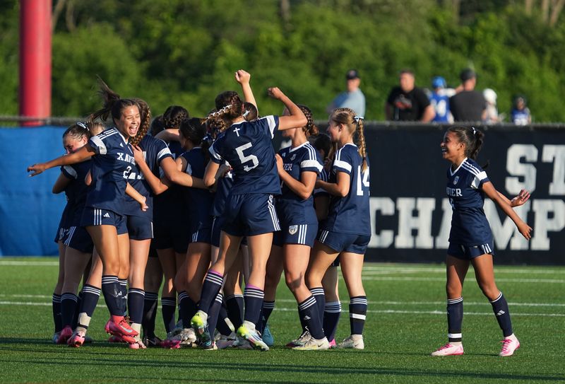 Xavier players celebrate a 1-0 victory over Lake Country Lutheran the WIAA Division 4 girls state soccer semifinal on Thursday, June 19, 2025 at Uihlein Soccer Park in Milwaukee, Wisconsin.