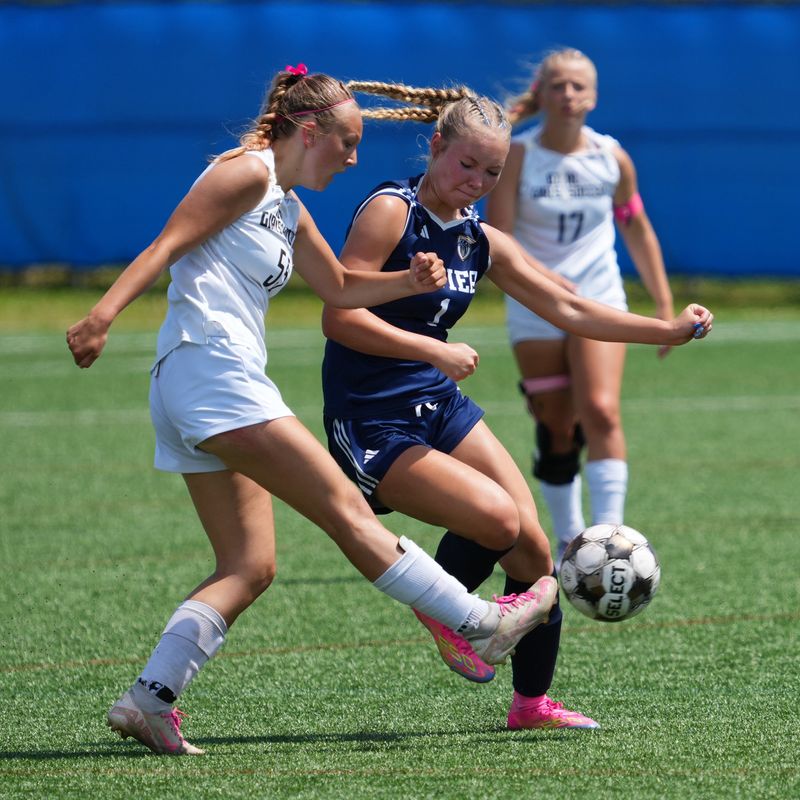 Xavier's Sydney Neilitz, right, battles Ozaukee/Random Lake's Kamrin Kunz during the WIAA Division 4 girls soccer championship game June 21 in Milwaukee.