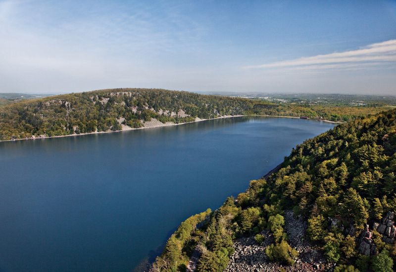 The 360-acre Devil's Lake is surrounded by 500-foot bluffs in Devil's Lake State Park near Baraboo.