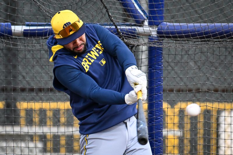 Milwaukee Brewers catcher Jeferson Quero takes batting practice during spring training on February 17, 2025, at American Family Fields of Phoenix in Phoenix, Arizona.
