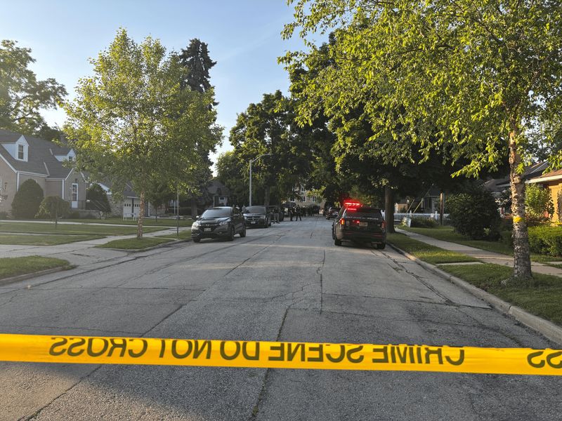 Police block off 91st and Orchard streets in West Allis after a neighborhood dispute turns deadly.