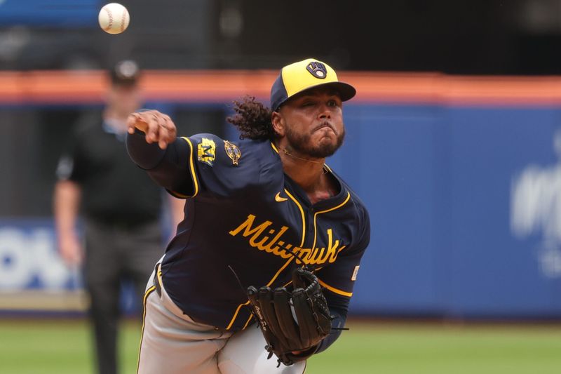 Jul 2, 2025; New York City, New York, USA; Milwaukee Brewers starting pitcher Freddy Peralta (51) delivers a pitch during the third inning against the New York Mets at Citi Field. Mandatory Credit: Vincent Carchietta-Imagn Images