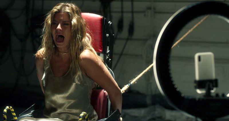 A group of social media influencers are taken to a mysterious house where getting the most "likes" is their only hope of survival in the horror thriller "Skillhouse."