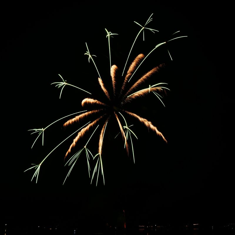 Fireworks explode over Fowler Lake during the annual Independence Day celebration in Oconomowoc on Friday, July 4, 2025.