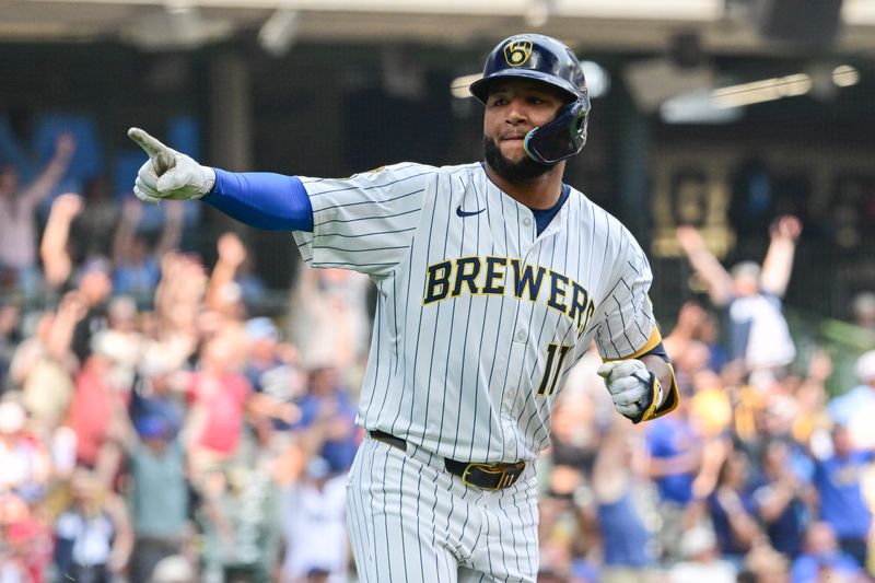 Brewers center fielder Jackson Chourio points into the dugout after hitting a three-run home run in the eighth inning against the Nationals on July 13 at American Family Field.