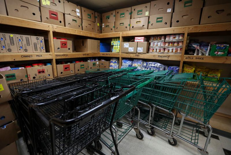 Carts are seen stockpiled on Wednesday, July 16, 2025, at a Salvation Army food pantry in Green Bay, Wis. Food pantries across the state are preparing for increased demand as a result of federal budget cuts to the Supplemental Nutrition Assistance Program.
Tork Mason/USA TODAY NETWORK-Wisconsin