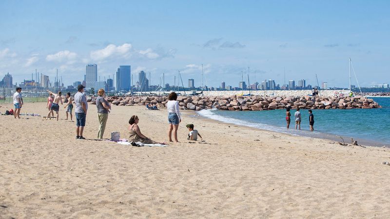 Beachgoers enjoying the new South Shore beach along Lake Michigan on Jul. 18, 2025. The popular beach in Milwaukee's Bay View neighborhood was moved farther south due to consistent closures from bacteria contamination.