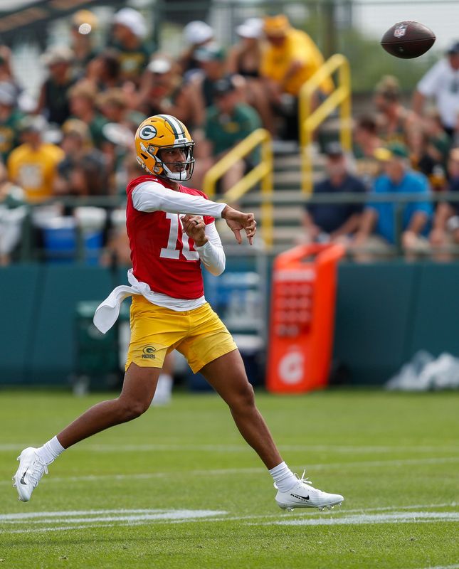 Packers quarterback Jordan Love passes during the first day of training camp July 23 at Ray Nitschke Field.