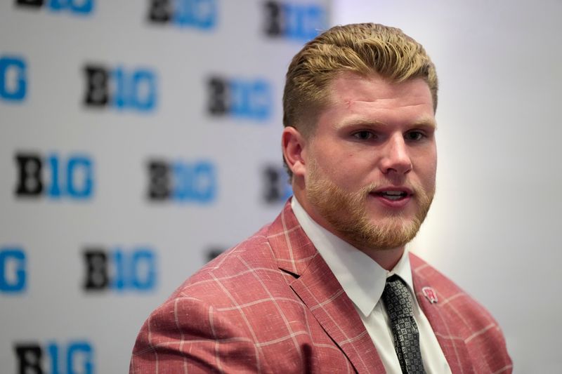 Jul 23, 2025; Las Vegas, NV, USA; Wisconsin offensive lineman Jake Renfro speaks to the media during the Big Ten NCAA college football media days at Mandalay Bay Resort. Mandatory Credit: Lucas Peltier-Imagn Images