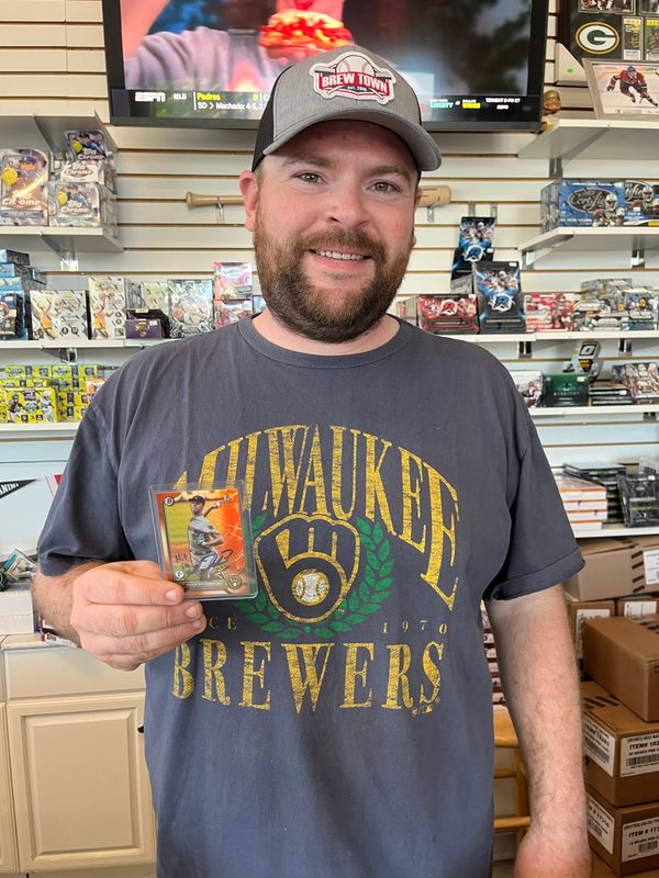 Brew Town Trading Co. assistant manager Tommy Rhyner was with Milwaukee Brewers pitcher Jacob Misiorowski when he pulled his card out of a pack at the store. He called it "probably my best hobby moment in of itself."