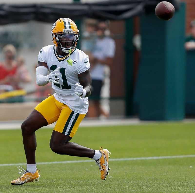 Green Bay Packers wide receiver Jayden Reed (11) catches a pass during the first day of training camp on Wednesday, July 23, 2025, at Ray Nitschke Field in Ashwaubenon, Wis. 
Tork Mason/USA TODAY NETWORK-Wisconsin