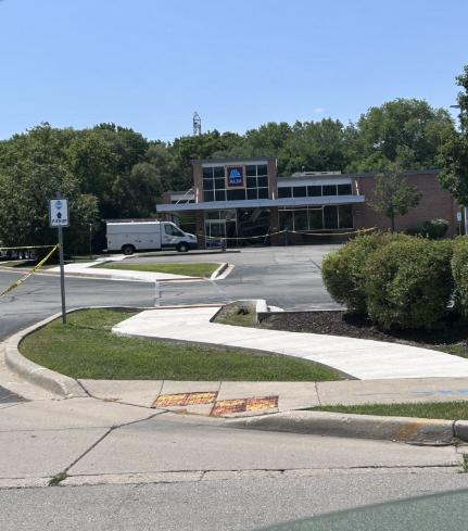 Tape wraps around an Aldi grocery store, 4225 S. 108th St., in Greenfield after a vehicle struck the front of the building on July 28. The crash was the result of a medical episode, according to city officials. No injuries were reported inside the vehicle or the store.