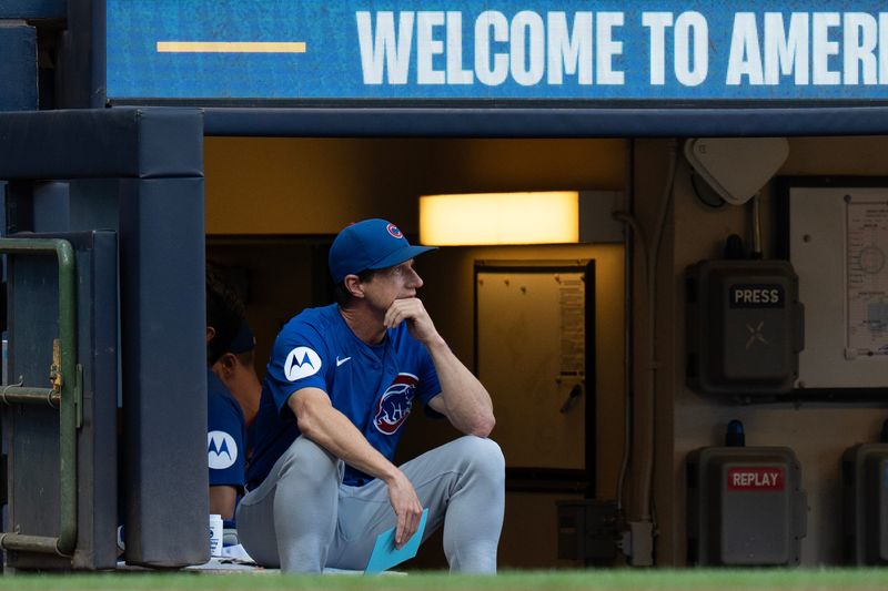 Cubs Manager Craig Counsell watches his team warm up at American Family Field in Milwaukee on the evening of July 28, 2025.