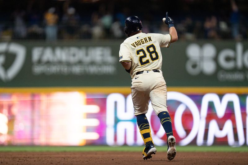 Milwaukee Brewers first base Andrew Vaughn (28) celebrates his grand slam in the sixth inning at American Family Field in Milwaukee on the evening of July 29, 2025.