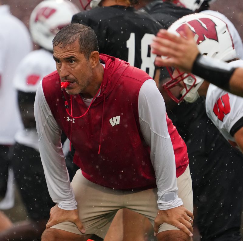 Wisconsin football head coach Luke Fickell observes practice Wednesday, July 30, 2025, at Ralph E. Davis Pioneer Stadium in Platteville, Wisconsin.