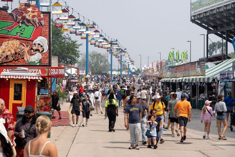 Guests attend the first day of the 2025 Wisconsin State Fair at the Wisconsin State Fair Park in West Allis on the morning of July 31, 2025.