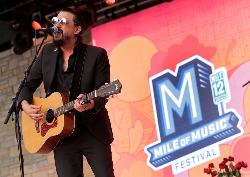Cory Chisel performs at Jones Park during the 12th annual Mile of Music festival Friday, August 1, 2025, in downtown Appleton, Wisconsin.