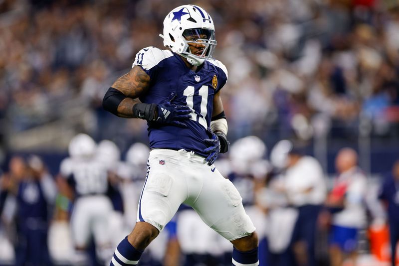 Nov 28, 2024; Arlington, Texas, USA; Dallas Cowboys linebacker Micah Parsons (11) celebrates after a sack during the third quarter against the New York Giants at AT&T Stadium. Mandatory Credit: Andrew Dieb-Imagn Images