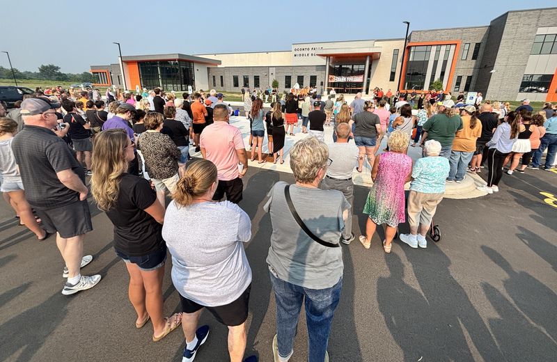 A crowd gathers outside Oconto Falls Middle School for an open house and ribbon-cutting for the new school on Aug. 4.