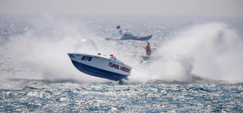 Team Tunnel Vision (579) is airborne during the Midwest Challenge boat races, Saturday, August 9, 2025, in Sheboygan, Wis.
