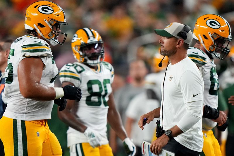 Green Bay Packers head coach Matt LaFleur walks onto the field between possession during a Week 1 NFL preseason game between the Green Bay Packers and the Cincinnati Bengals,Friday, Aug. 11, 2023, at Paycor Stadium in Cincinnati.