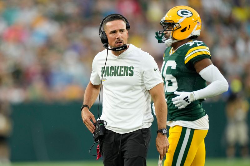Aug 9, 2025; Green Bay, Wisconsin, USA; Green Bay Packers head coach Matt LaFleur looks to the sideline as Green Bay Packers cornerback Bo Melton (16) runs off the field during the first quarter against the New York Jets at Lambeau Field. Mandatory Credit: Kayla Wolf-Imagn Images