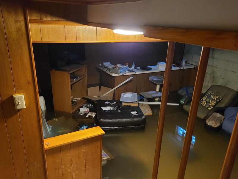 Jacqueline Zeledon has up to three feet of water in her basement on Milwaukee’s northwest side near Glendale after severe weather hit the region August 9. She said four neighbors experienced similar flooding.