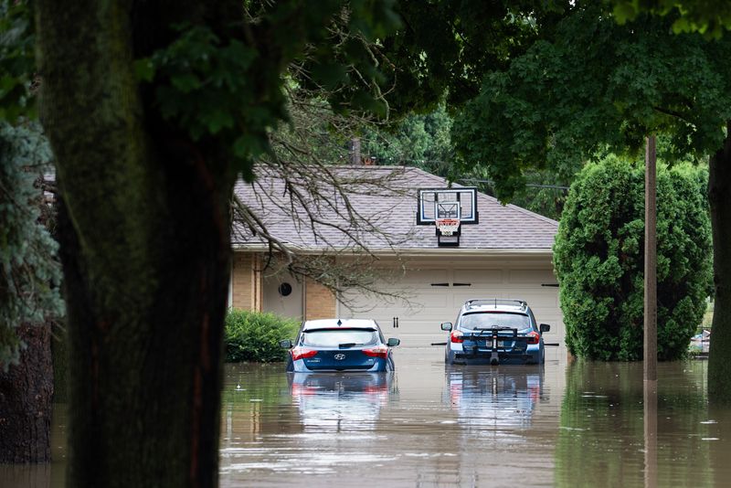 Flooded homes seen on W Argonne Drive after overnight storms in Wauwatosa on the morning of Aug. 10, 2025.