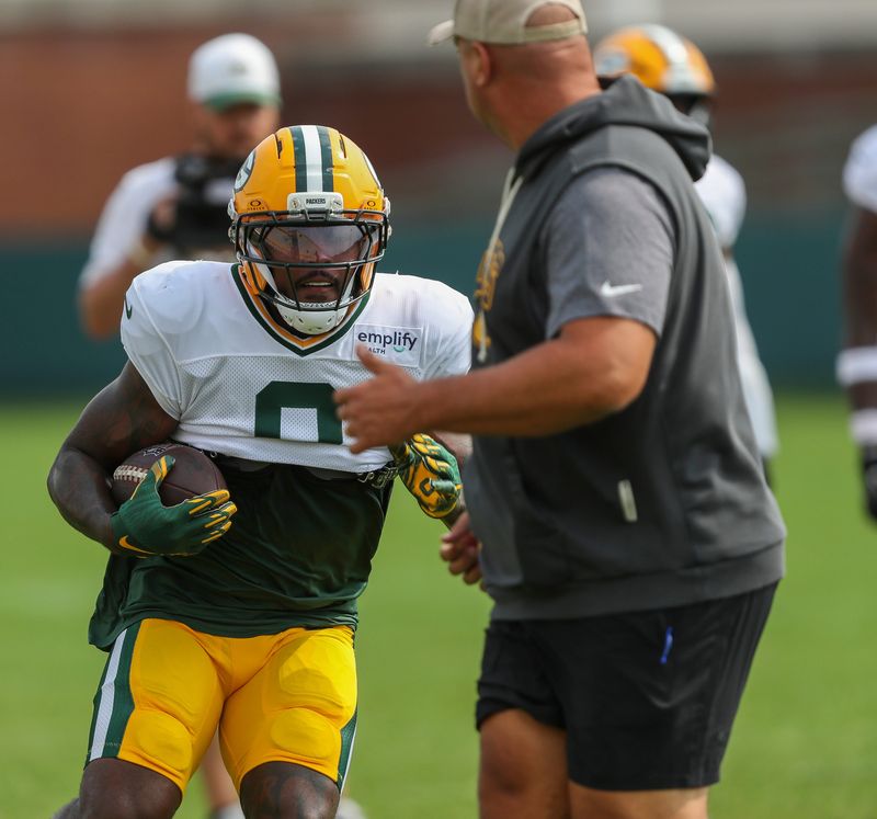 Green Bay Packers running back Josh Jacobs (8) runs through a drill during practice on Tuesday, August 12, 2025, at Ray Nitschke Field in Ashwaubenon, Wis. 
Tork Mason/USA TODAY NETWORK-Wisconsin