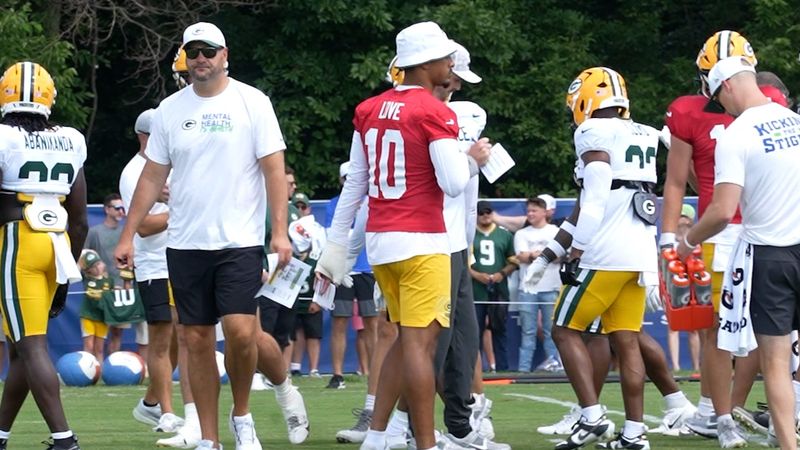 Packers QB Jordan Love with his thumb wrapped watching the team's joint practice with the Colts