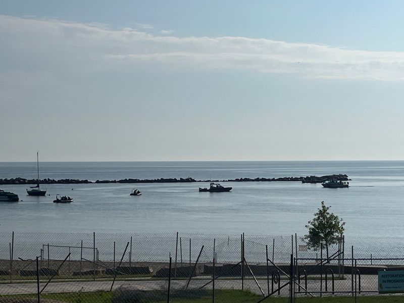 Milwaukee rescue boats were in Lake Michigan off South Shore Beach this morning searching for someone an eye witness said was swimming and went underwater.