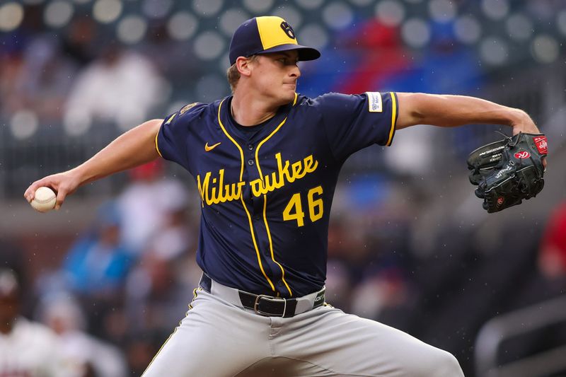 Milwaukee Brewers starting pitcher Quinn Priester (46) throws against the Atlanta Braves in the second inning at Truist Park on August 4, 2025, in Atlanta.