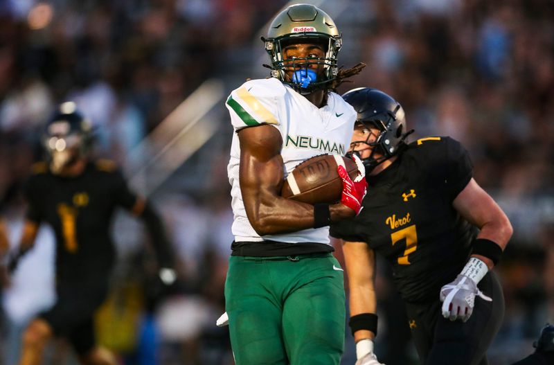 Neumann Celtics receiver Jayden Petit (3) runs after making a catch during the second quarter of a preseason game against the Bishop Verot Vikings at Bishop Verot High School in Fort Myers, Fla., on Friday, Aug. 15, 2025.